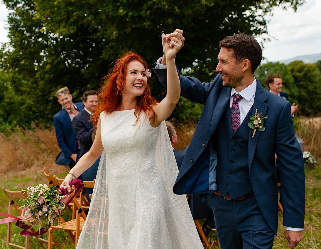 Documentary wedding photographer capturing relaxed couple after ceremony in Bristol
