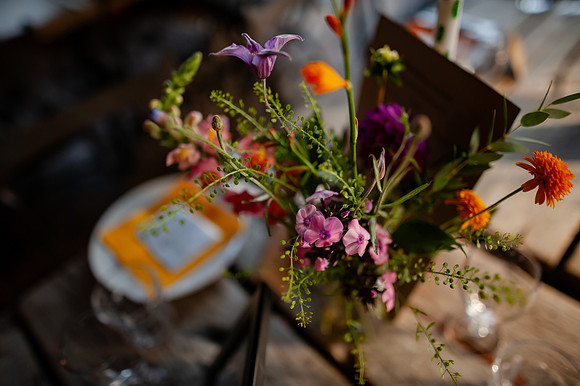 wedding floral arrangements at the mud dock cafe wedding reception-1